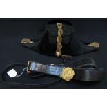 An early 20th century naval officer's cocked hat, epaulettes and black leather belt, by Gieves