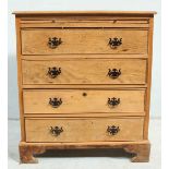 A 20th Century pine bachelor chest  with sliding writing board above four long drawers, raised on