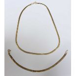 A flat 9ct gold necklace and similar gold bracelet. 13.8 grams total.