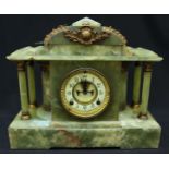 A large Victorian onyx mantle clock, with American Ansonia movement, white enamel dial and column