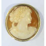 A round cameo brooch framed in 15ct gold.