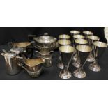 A set of ten silver-plated wine goblets of chalice form, with tapering bowls and circular
