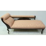 A Victorian stained-wood chaise lounge with floral pink damask upholstery, raised on cabriole