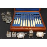 A cased set of silver plated dessert knives and forks, with silver collars, together with a Walker &