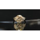 A large solitaire diamond ring, claw-set in platinum with a large round brilliant cut diamond,