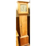 A 20th Century pine longcase clock with 30-hour movement, the square dial painted with a bird