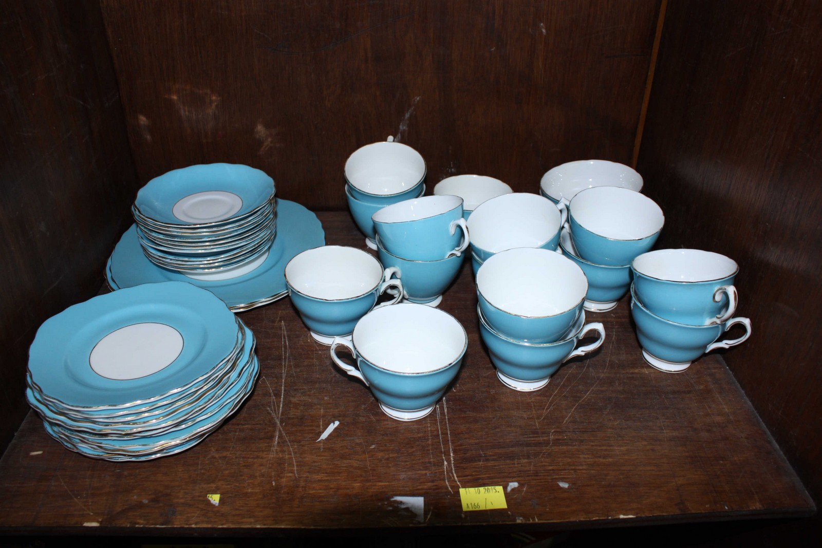 SECTION 54. A turquoise and white glazed tea set.