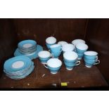 SECTION 54. A turquoise and white glazed tea set.