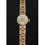A ladies Accurist 9ct gold wrist watch, with 21 jewel manual movement. 13.2 grams total.