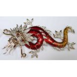 A large Butler & Wilson gilt metal and enamel Chinese dragon brooch, decorated with paste stones.