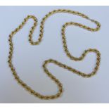 A long 9ct gold rope twist chain necklace. 22.8 grams.