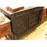 19th century continental carved oak sideboard, with two frieze drawers above a pair of arched