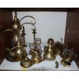 SECTION 10. A collection of Eastern brass ware, comprising hanging lights, teapots, pots,