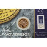 A 2000 22ct gold half sovereign, in Royal Mint display slip.