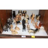 SECTION 28. A collection of twenty one Beswick and other model dogs.