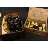 An early 20th century boxwood and ebony Calvert pattern chess set, the king measuring 10cm high,