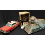 Toys. A Japanese tin plate 'Moon Car' in box, together with a 'Piggy Cook' in box, and a tin plate