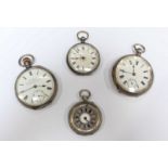 Two early 20th century silver pocket watches and two smaller Victorian silver ladies fob watches. (