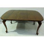 An early 20th century mahogany Queen Anne style dining table, with plain top, one leaf and supported