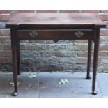 Mid-18th century mahogany folding tea table, of rectangular form, with square protruding corners and