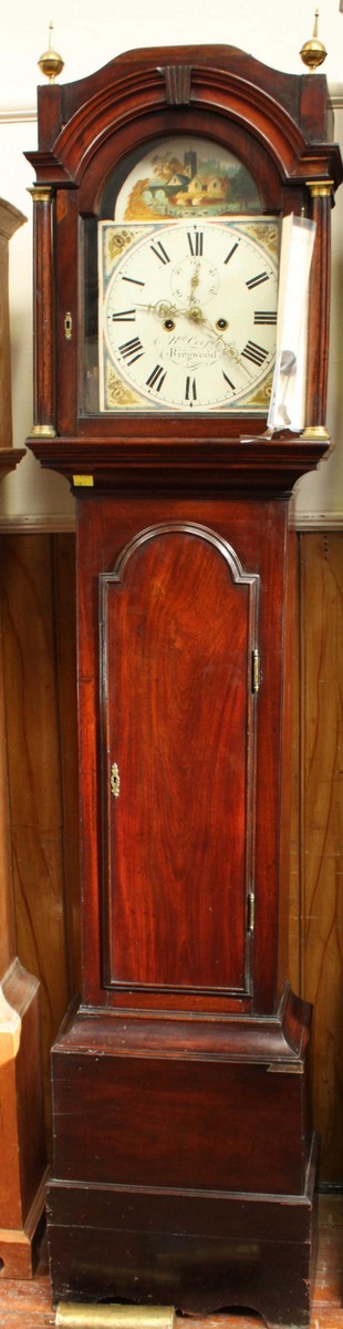 A George III mahogany eight day long case clock by Robert Cooper Ringwood, with painted arched top