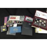 A collection of six Royal Mint British coin proof sets in original boxes, together with other