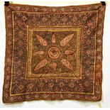 Kashmiri embroidered square cover, the wool(?) ground elaborately embroidered in coloured wools in a