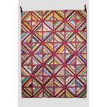 Two modern European presentation patchwork quilts, the first with squares of diagonal floral and