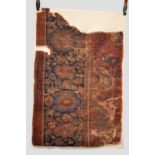 Interesting Ushak carpet fragment, west Anatolia, 17th century, 4ft. 2in. (max) x 2ft. 8in. 1.27m. x