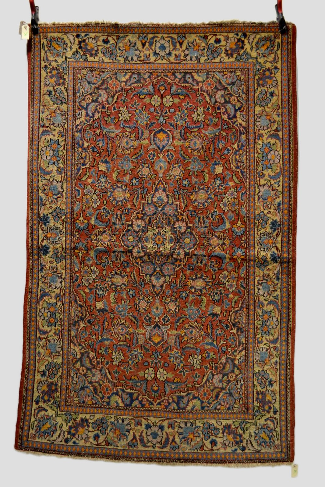 Kashan rug, west Persia, about 1930s, 6ft. 9in. x 4ft. 3in. 2.05m. x 1.30m. Some wear in places.
