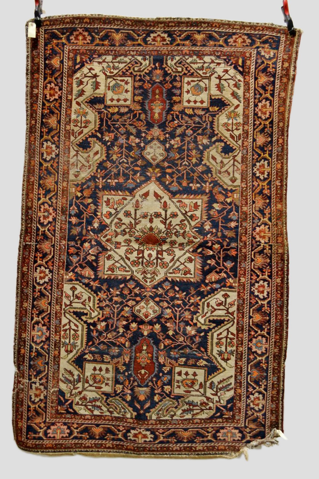 Malayer rug, north west Persia, about 1930s, 7ft. x 4ft. 3in. 2.13m. x 1.30m. Overall wear; kinks/