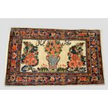 Attractive Saruk landscape rug with inscription, north west Persia, 20th century, 2ft. 10in. x