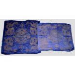 Two Chinese silk and metal thread brocade seat covers, the first: deep purple/blue silk ground woven