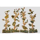 Collection of 18th century crewel­work pieces comprising four long pieces of stems of foliage rising
