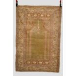 Ghiordes prayer rug, west Anatolia, late 19th century, 5ft. 4in. x 3ft. 7in. 1.63m. x 1.09m. Overall