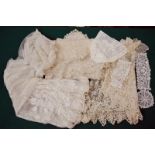 Collection of lace comprising: Honiton wedding veil with appliqué motifs to edges, corners and