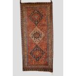 Qashqa’i long rug, Fars, south west Persia, late 19th century, 8ft. x 3ft. 9in. 2.44m. x 1.14m.