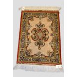 Hereke signed silk rug, the narrow kelim ends with piled silk floral details, each end with a