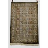 Kashmiri silk pile rug, north India, mid-20th century, 6ft. 1in. x 4ft. 1.86m. x 1.22m. Overall