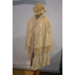 Collection of children’s clothing including a cream corded wool(?) christening cape with integral