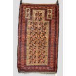 Baluchi prayer rug with pale yellow mihrab, Khorasan, north east Persia, early 20th century, 5ft.