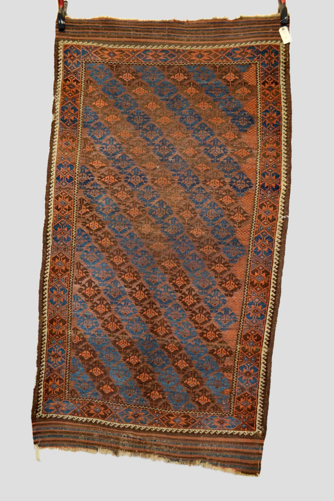 Baluchi rug, Khorasan, north east Persia, circa 1880, 6ft. 2in. x 3ft. 4in. 1.88m. x 1.02m. Note the