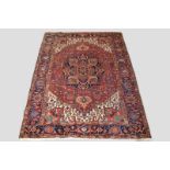 Heriz carpet, north west Persia, about 1920s, 10ft. 6in. x 7ft. 9in. 3.20m. x 2.36m. Slight wear
