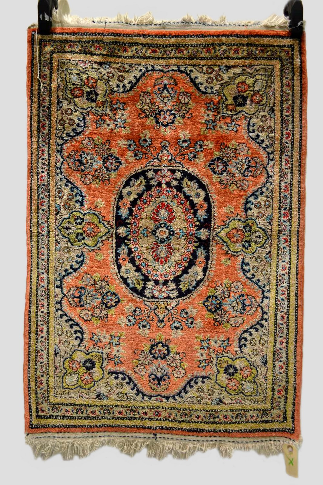 Qum silk mat, south central Persia, mid-20th century, 2ft. 10in. x 1ft. 11in. 0.86m. x 0.59m.