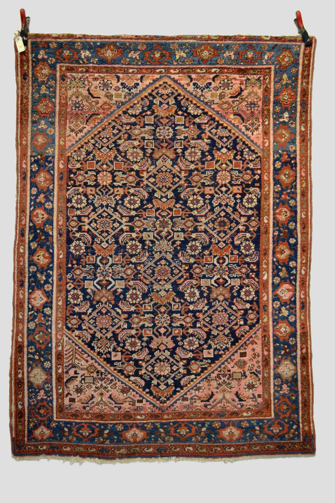 Two Hamadan rugs, north west Persia, mid-20th century, the first 7ft. x 4ft. 10in. 2.13m. x 1.47m.