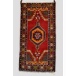 Yahyali rug, central Anatolia, about 1930s, 6ft. 2in. x 3ft. 2in. 1.88m. x 0.97m. Slight loss to top