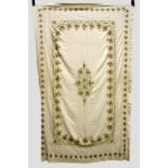 Silk bedcover embroidered with attractive floral design in floss silks in autumnal colours, with