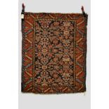 Heriz rug, north west Persia, circa 1920s, 4ft. 2in. x 3ft. 5in. 1.27m. x 1.04m. Overall wear;
