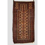 Baluchi prayer rug, Khorasan, north east Persia, about 1900, 6ft. 4in. x 3ft. 3in. 1.93m. x 1m.