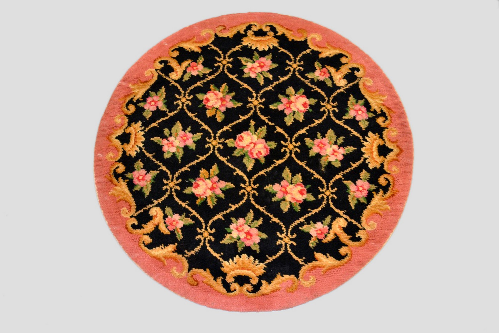 Savonnerie circular rug, France, about 1930s, 3ft. 10in. dia.; 1.17m. dia. Together with a Kashmir